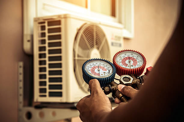Professional Hvac Installation technician working in Puryear, TN